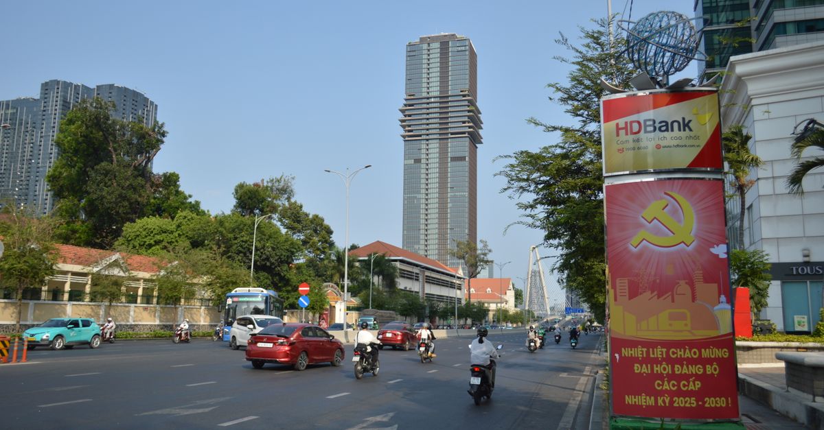 Street view in Ho Chi Minh City showcasing HD Bank signage and traffic.